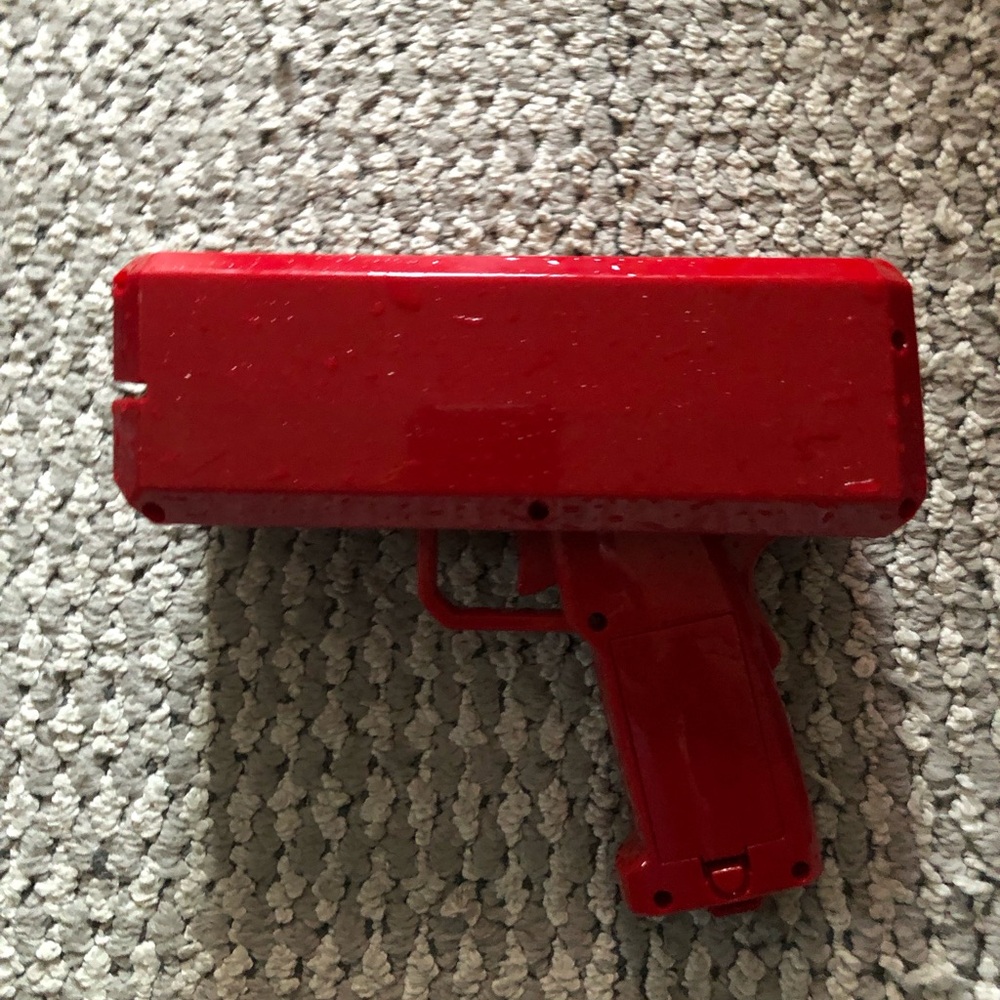 Red Handheld money Toy Gun